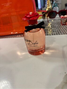 Dolce & Gabbana Pink Perfume Bottle with Red Floral Cap